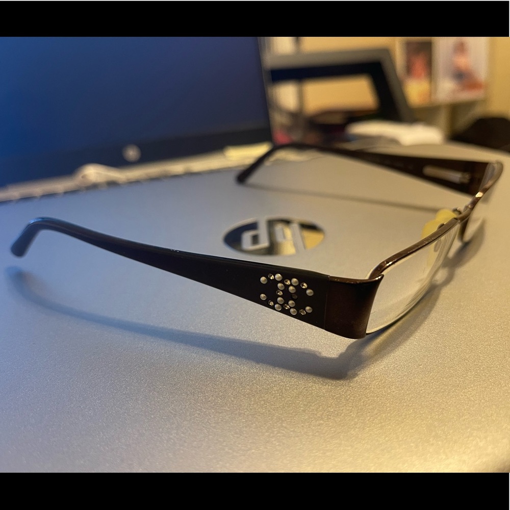 Chanel frame for prescription lenses.  Lady’s.